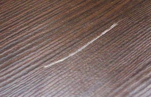 Царапины на ламинате царапина на поверхности ламината